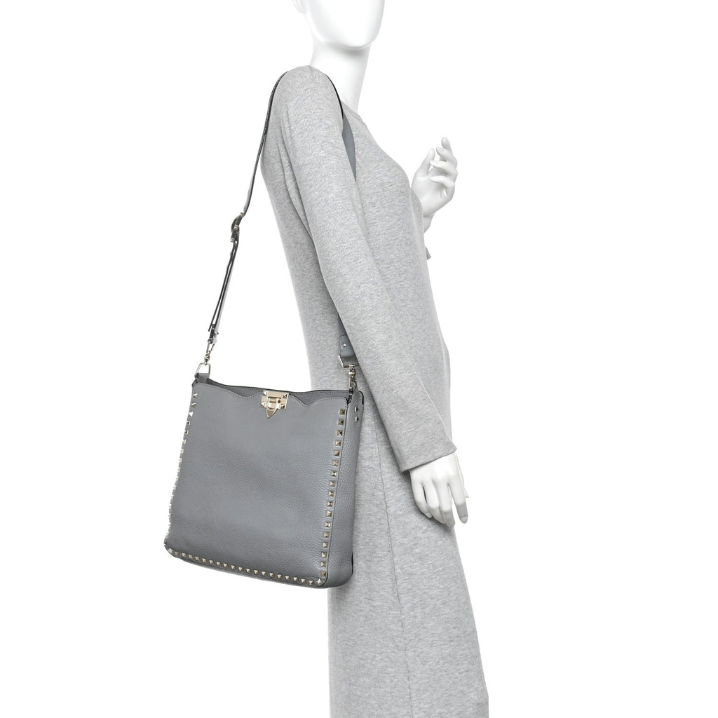 Pebbled Calfskin Small Rockstud Flip-Lock Messenger Bag Light Stone