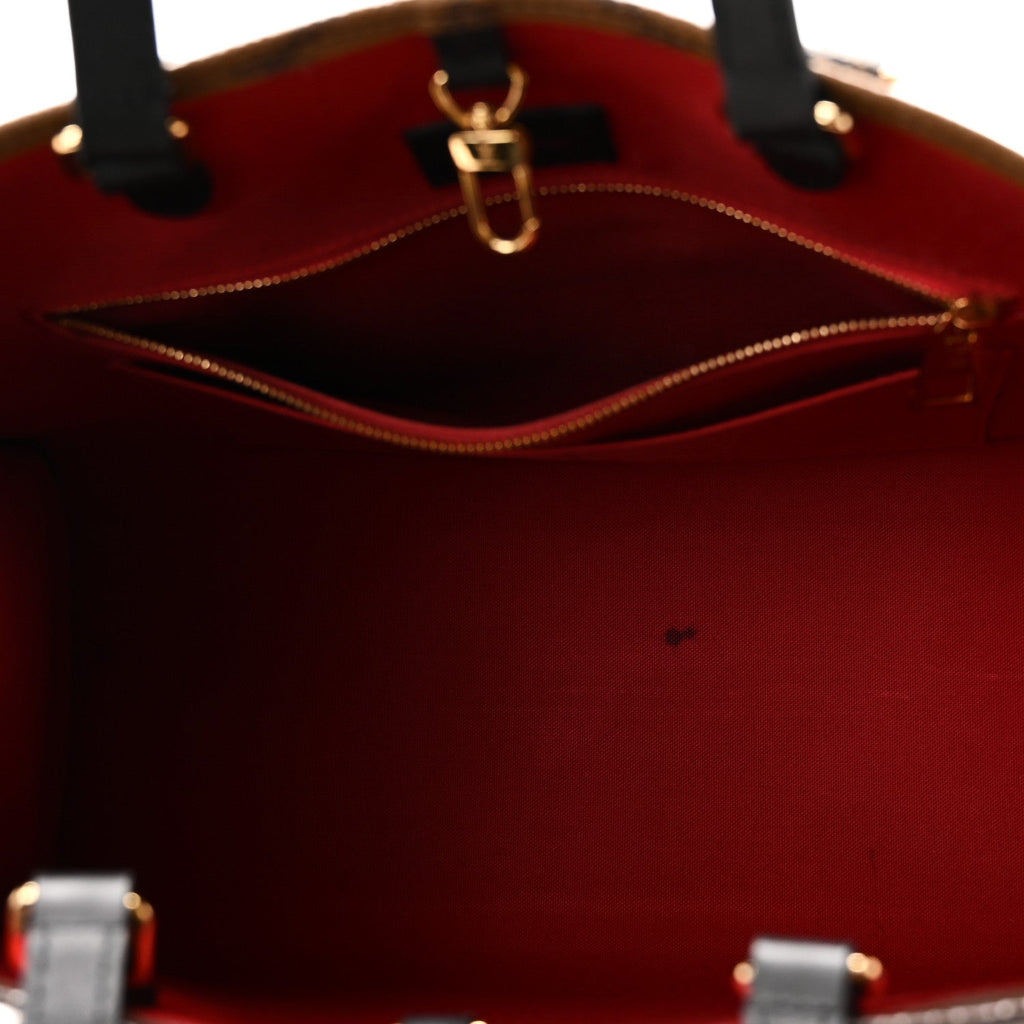 Reverse Monogram Giant Onthego MM