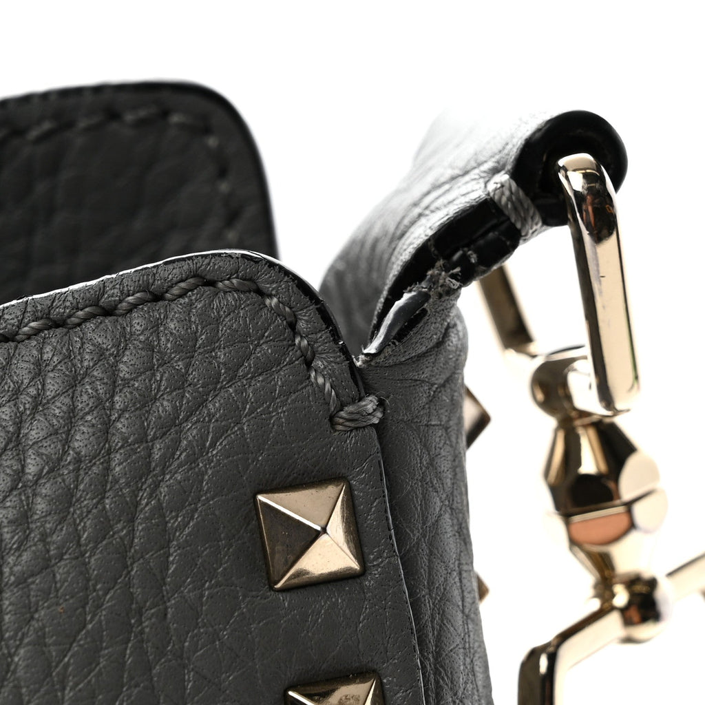 Pebbled Calfskin Small Rockstud Flip-Lock Messenger Bag Light Stone